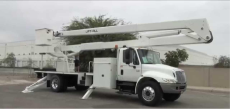 Cherry picker with outriggers extended